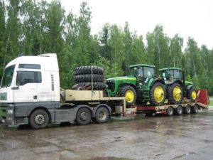 Перевозка гусеничных и колесных тракторов на трале